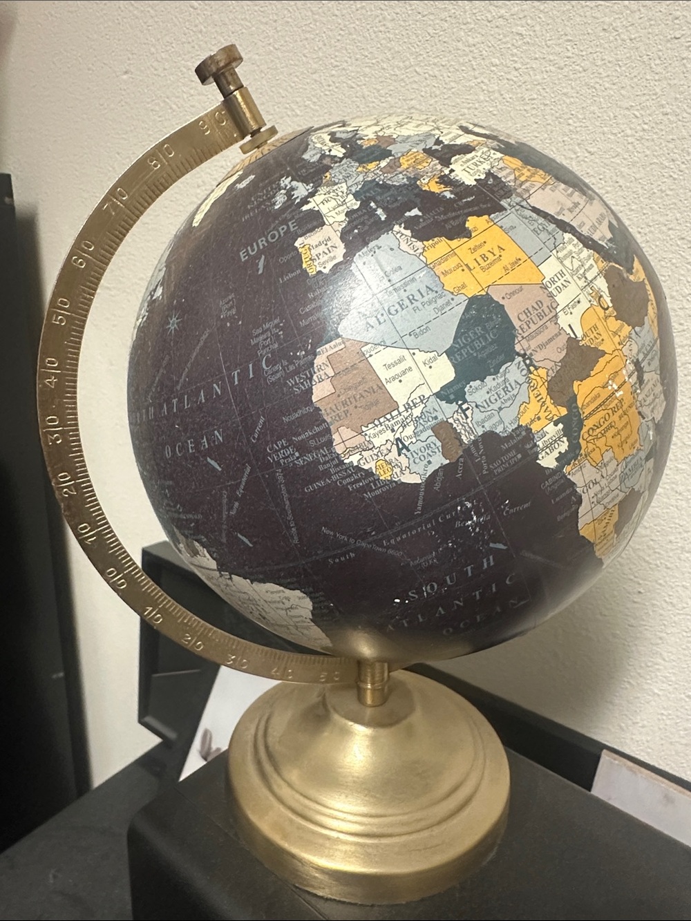 Brass-Base Decorative World Globe in Plum and Gold. Light weight.